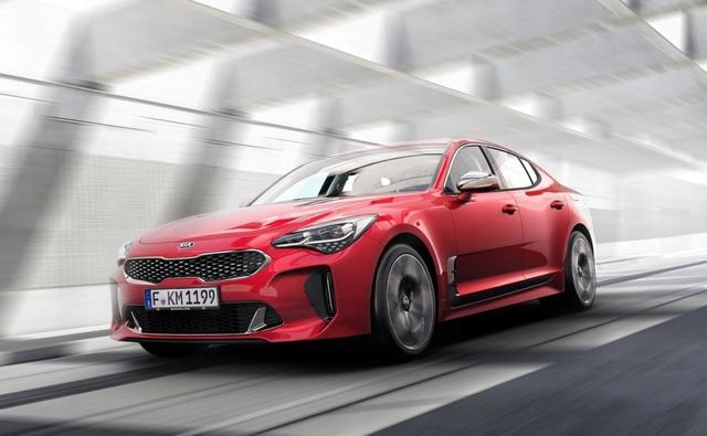 This red sleek four door car you see here is the brand spanking new Kia Stinger and although Kia is expected to come to India very soon, this isn't the kind of vehicle they are expected to bring to our country anytime soon.