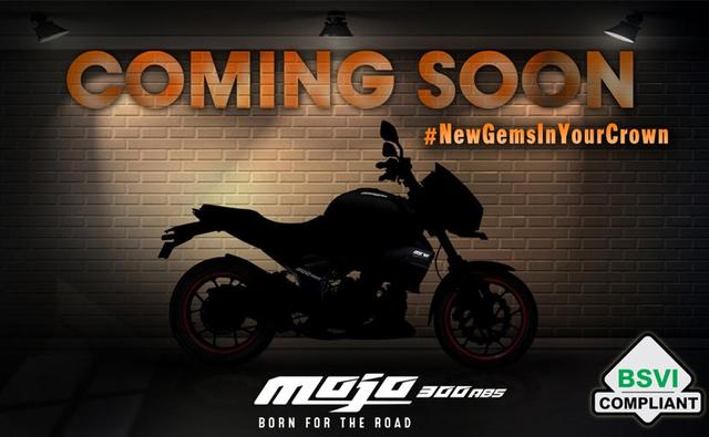 Mahindra Two-Wheelers has released a teaser image of the upcoming BS6 compliant version of the Mojo 300. The updated motorcycle will finally meet the new emission regulations allowing the company to begin sales once again. The Mahindra Mojo 300 ABS was pulled off the shelves in April this year after the industry's transition to the new norms. The teaser image reveals little about the changes on the motorcycle barring the BS6 badge on the extended tank shroud and the 300 ABS stickering on the side panel. The bike is not expected to feature any major change.