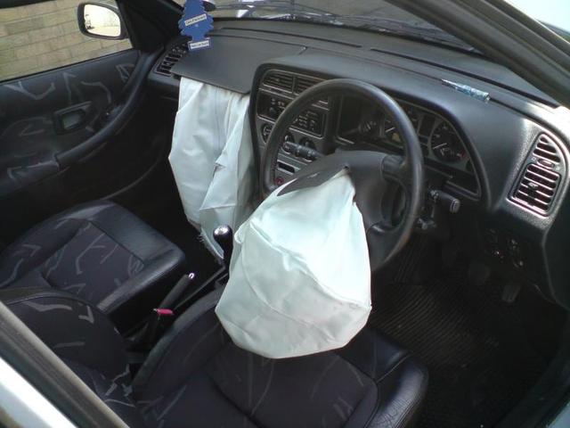 An airbag's purpose is to provide safety to the driver and other passengers in the case of a crash. Safety is ensured by providing an inflatable airbag that comes out automatically during a crash and provides the required soft cushioning to the passengers.