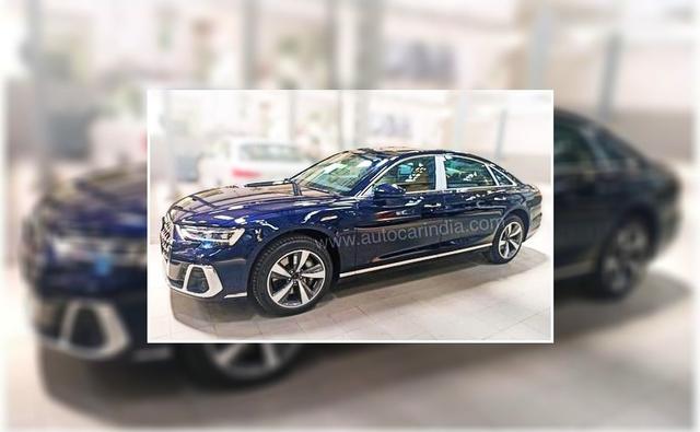 The Audi A8 L facelift was spotted at a showroom recently, hinting at an imminent launch with pre-bookings open since May this year for a token amount of Rs. 10 lakh.