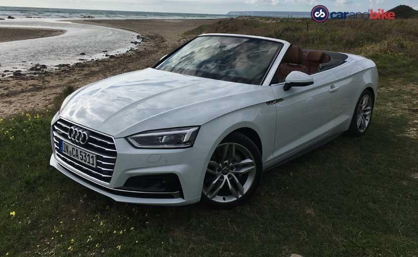 The new A5 Cabriolet is a stunner. The Cabrio uses the same face as the coupe, but naturally has different flanks and rear. It has a bold and wide face, accentuated by the new grille and a very sculpted and menacing new hood.