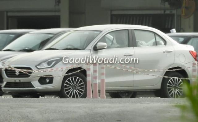 The new-gen Maruti Suzuki Swift Dzire is all set to be launched in a few months and the company is currently readying the car for the big arrival. While we have already shared the first spy images of the production version of the car and also the pictures of the new interior, the car has been spotted again and this time in a couple of new colours and new alloy wheels.