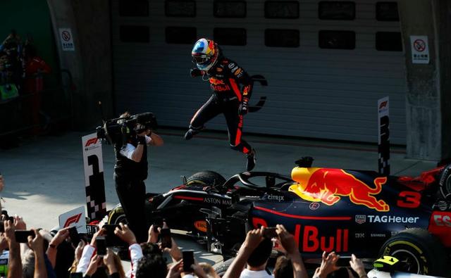 In a dramatic finish to the Chinese Grand Prix, Red Bull Racing's Daniel Ricciardo took his first win of the season after a late charge towards the top spot in the race. The Australian driver passed Valtteri Bottas in the second half of the race to take the lead, while Kimi Raikkonnen of Scuderia Ferrari took another consecutive podium coming in third. Pole sitter Sebastian Vettel dropped to P8 after a mess of a second half including a collision with Max Verstappen, which demoted the Dutch to fifth behind Lewis Hamilton.