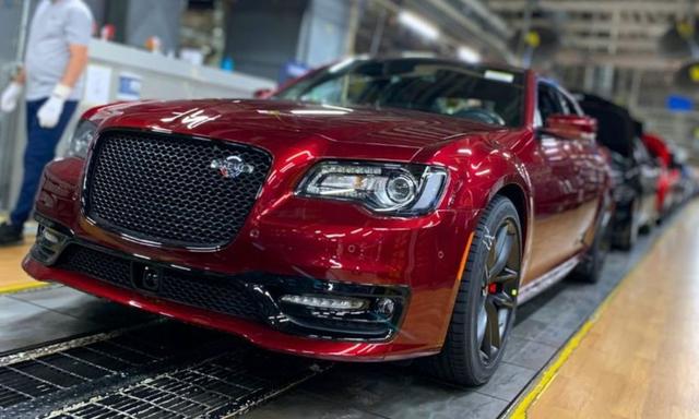 The final model, a Velvet Red 2023 Chrysler 300C, powered by a 6.4L V8 Hemi engine, was celebrated by the Brampton team.