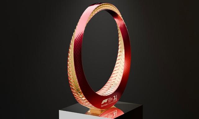 Designed by Pininfarina USA and Lenovo, the wearable trophy lights up when raised above the neck or worn by the winner.
