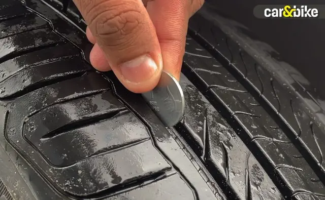 Is it time to change your car's tyres? Find out by taking the coin test. Here's how. 