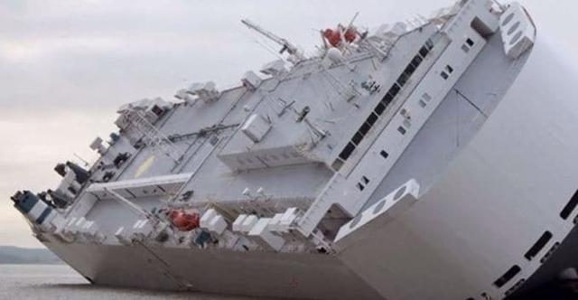 Jaguar Land Rover said on Tuesday it was awaiting word on the fate of 1,200 luxury vehicles aboard a 51,000-tonne car transporter ship that has run aground in the English Channel.