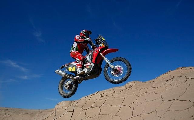 KTM rider, Toby Price, won stage 8 of the Dakar rally 2016 by registering a five minute and 17 second win over Honda's Paulo Goncalves, and leading the overall standings by over two minutes.