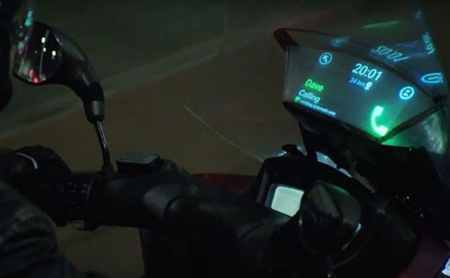 Samsung, in collaboration with Yamaha has developed a new technology - adding a smartphone-connected display to the windshield of a motorcycle. The 'smart' windshield displays notifications like calls and texts on a head-up display on the screen, with the software designed to be hands-free.
