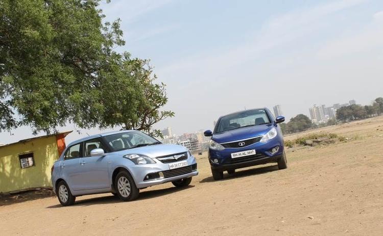 We pit the new Maruti Suzuki Swift Dzire AGS with its closest rival Tata Zest AMT to which one is the better sub-compact sedan with a diesel AMT.