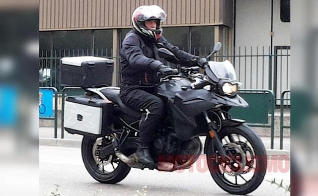 A new, parallel-twin, GS-styled touring motorcycle from BMW has been spied testing in Italy. The bike, sporting alloy 'road' wheels, has styling similar to other GS models from BMW.