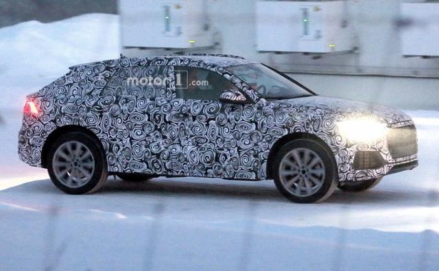 Audi Q8, the upcoming flagship coupe-SUV from the Ingolstadt-based carmaker is all set to make its official debut this month at the 2017 North American Motor Show, in Detroit. While last month we brought you the official teaser images of the first-ever Q8, now we have come across the first spy image of the all-new Audi Q8.