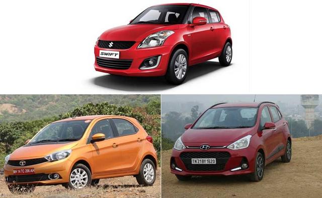 The 2017 Grand i10 squares up against the well-doing Tata Tiago and the long standing war-horse, the Maruti Suzuki Swift. It would be interesting to see how the Grand i10 facelift goes up against these two. So let's get going with an on-paper comparison between the three.