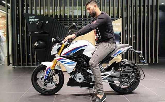 Yuvraj Singh is a huge BMW fan and the cricketer has over the years added a number of offerings from the Bavarian automaker to his garage. In a change of pace though, the all-rounder has added something small, fast and distinctly Bavarian, albeit on two-wheels. This is the recently launched BMW G 310 R we are talking about the Indian cricketer was recently taking delivery of the street fighter at a BMW Motorrad dealership. The G 310 R is the German giant's smallest motorcycle yet and is made-in-India carrying a price tag of Rs. 2.99 lakh (ex-showroom).