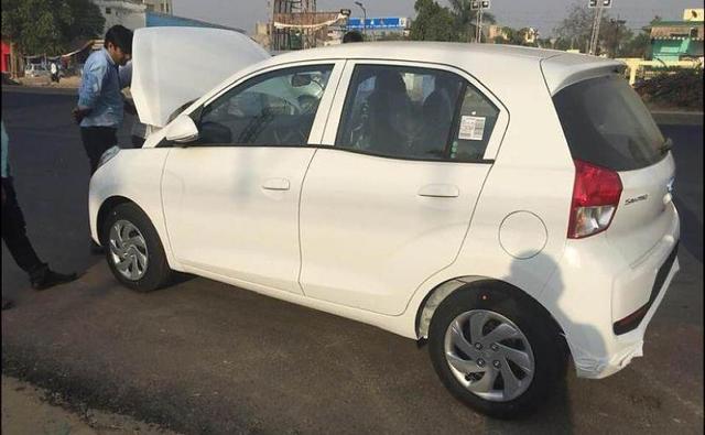 Images of the top-end Asta variant of the soon-to-be-launched new Hyundai Santro have leaked online and this time around we finally get to see the car inside out. While Hyundai had released a couple of images of the car, this is the first time that we get to see the rear portion of the upcoming tallboy hatchback.