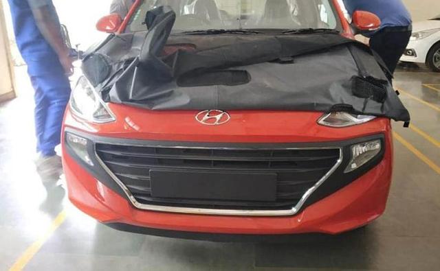 The new generation Hyundai Santro, codenamed AH2 is all set to be unveiled tomorrow, October 9, 2018, and will be bringing back the iconic small car in a completely new avatar. We've seen a glimpse of the hatchback in the recently leaked images, and CarAndBike can now confirm that bookings for the new Santro will start exclusively online on October 10 2018. Hyundai dealers in Mumbai and Delhi have confirmed the development to CarAndBike with the model being available to book on the company's website. Users will have to select the booking option and can pay the minimum token amount of Rs.10,000 and select their preferred dealer choice when booking the model. Deliveries for the model will commence by the end of this month after the launch on October 23.