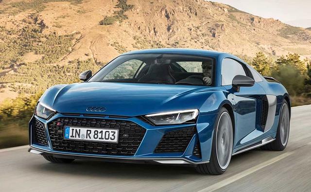 The second generation Audi R8 has reached its mid lifecycle and the Ingolstadt-based automaker has rolled out an updated version of its flagship supercar to keep things trending. This is the 2019 Audi R8 and it now comes with sharper styling alongwith more power thanks to the upgrades made to the 5.2-litre V10 engine. The 2019 R8 will be making its public debut at the Los Angeles Auto Show later this year with the complete range, while the supercar will be hitting showrooms globally early next year. The Audi R8 is sold in India as well and the updated model will make its way to the country sometime in 2019.