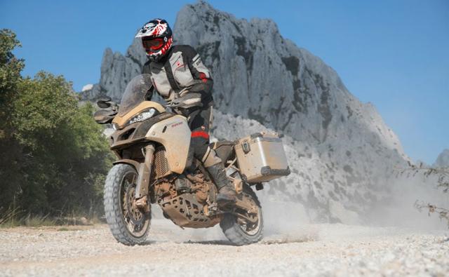 Days after releasing the teaser, Ducati Motor has pulled the wraps off the Multistrada 1260 Enduro for the 2019 model year. As it was with the Multistrada 1200 Enduro on sale, the 2019 Ducati Multistrada 1260 Enduro gets the additional treatment for off-road applications, while retaining the improvements from the standard Multistrada 1260. This means that power continues to come from the 1262 cc Testastretta DVT V-Twin engine shared with the XDiavel tuned for 1The 2019 Ducati Multistrada 1260 gets a bigger motor, lighter kerb weight and a host of new electronics on offer.56 bhp and 127 Nm of peak torque.