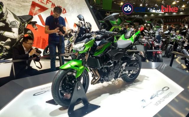 An expected debut, Kawasaki has revealed the 2019 Z400 naked motorcycle at the 2018 EICMA Show in Italy. The new Kawasaki Z400 is the stripped version of the Ninja 400, minus the fairing, clip-on handlebars and the aggressive riding position. What you get instead is the same powerful engine and chassis as the Ninja 400, with minimal body panels. Globally, the new Z400 replaces the Z300 in the bike maker's line-up and will compete against the KTM 390 Duke, Yamaha MT-03 and the likes.