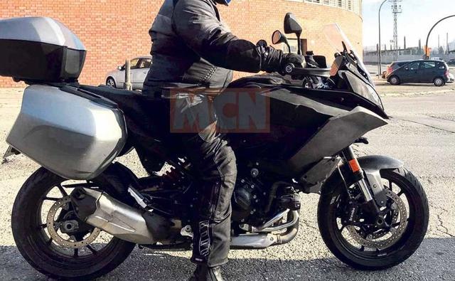 Spyshots of an all-new BMW sport touring motorcycle have emerged and it might be a production version of the BMW 9Cento concept model which was showcased earlier this year at Concorso d'Eleganza Villa d'Este.