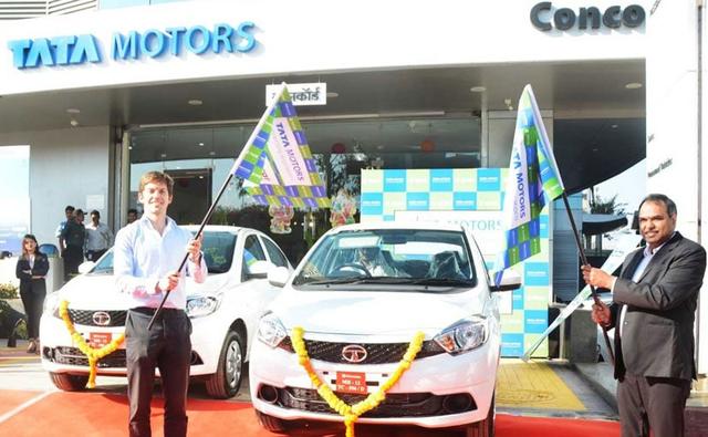 After supplying electric vehicles to the government, Tata Motors has now partnered with self-drive rental company Zoomcar and will be offering 500 Tata Tigor electric vehicles. The Tigor EVs are being supplied for operations only in Pune for now. The first batch of the Tata Tigor electric vehicles were flagged off at a ceremony in Pune at the automaker's dealership. The rental company plans to reach out to 20 cities with the 500 Tata electric cars by next year. Tata Motors produces the Tigor EVs at the company's facility at Sanand, Gujarat and has been supplying the same to EESL.