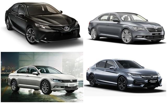 The 2019 Toyota Camry today officially went on sale in India, and the car is now more stylish, smarter, and well-equipped.But where does it stand against its key rivals - the Honda Accord, Skoda Superb, and Volkswagen Passat on paper? Let's find out.