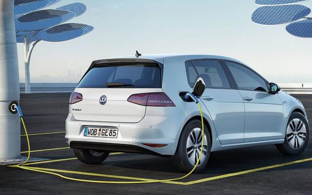 Volkswagen massively expanded Tuesday its plans for electric car sales in the coming decade, as its scramble to meet tougher greenhouse emissions targets has already begun weighing on profitability.