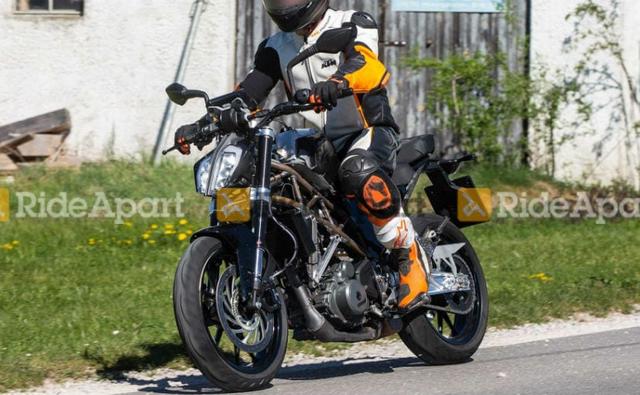 The KTM 390 Duke is one of the must successful small capacity performance motorcycles on sale and continues to be a lucrative choice for those looking for power on a budget. While, second generation 390 Duke continues to be strong seller globally, KTM has commenced work on the third iteration of the motorcycles, spy shots have emerged for the first time while testing in Germany. The 2021 KTM 390 Duke is expected to see major upgrades over the current version with changes to the frame, engine and more. The test mule does miss out on the bikini fairing of the current version, which could mean slight design revisions as well.