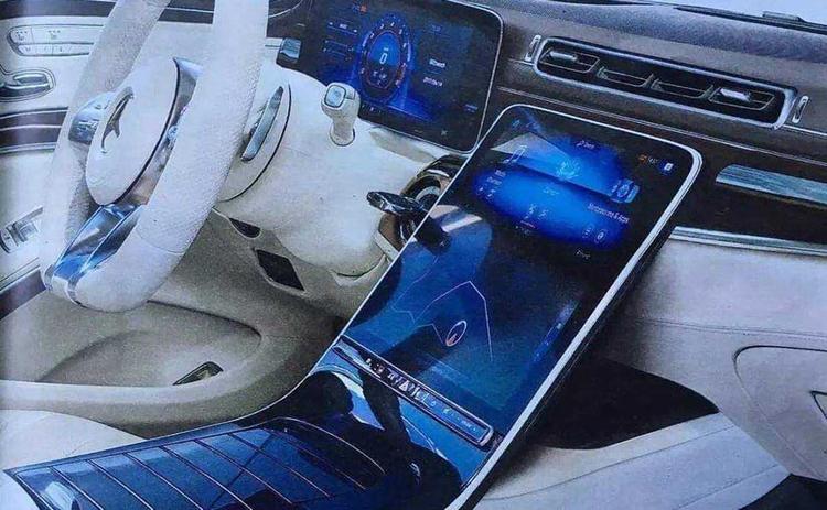 Mercedes-Benz is readying the next generation of its flagship S-Class sedan and while we've seen test mules in the past, a leaked image of the interior have now made its online. The next generation Mercedes-Benz S-Class due to make its debut sometime in 2020 and going by the leaked image, the car appears future ready. Confirmed by earlier spy shots, the new S-Class replaced the dual infotainment screen with single unit for the instrument console and a massive vertically-stacked display for all other controls. The Tesla like touchscreen system replaces a tonne of switches on dashboard that gets a clutter-free appearance with sleek looking air-con vents and a new steering wheel. The leaked image also reveals the dual-tone treatment to the cabin in pristine while and black shades.