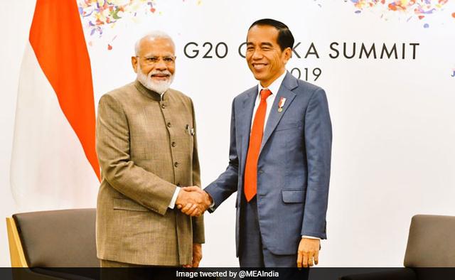 India and Indonesia on Saturday set an ambitious USD 50 billion target for bilateral trade over the next six years as Prime Minister Narendra Modi and President Joko Widodo discussed ways to deepen cooperation in a number of key areas including economy, defence and maritime security.
