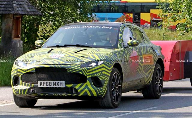 The Aston Martin DBX will be powered by an AMG sourced 493 bhp, 4.0-litre, twin-turbo V8 motor. The company is also expected to offer the DBX with its in-house V12 engine sometime later and a hybrid variant with improved low-end torque is also under evaluation. The spy pictures also show a roll cage at the rear and some extra hardware on the rear seat which simulates the added weight of the rear passengers. Since it's still a prototype, production-ready elements like final taillights and the flush rear door handles are missing at the rear.
