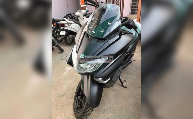 An updated version of the Suzuki Burgman Street was recently spied and the 125 cc scooter is all set to get a new colour option in India. The new shade in question is matte black and will join the existing colour options on the offering. The Burgman Street is currently available in gloss black, metallic white and matte grey shades. The new stealth themed black shade will bring a new and sporty look to the scooter. The spy images have emerged from what looks like a dealer stockyard, hinting at an imminent launch in the following weeks.