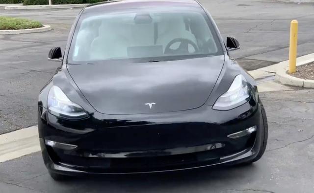 U.S. regulators are looking into parking lot crashes involving Tesla Inc cars driving themselves to their owners using the company's Smart Summon feature, the National Highway Traffic Safety Administration (NHTSA) said on Wednesday.