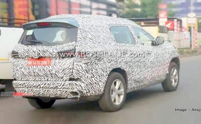 A prototype model of Tata Motors' HX7 based SUV, the 7-seater version of the Harrier, was recently spotted testing in India, and this time around we even get a small sneak-peek at the SUVs cabin as well. While the carmaker has already revealed the SUV at the Geneva Motor Show, with the nameplate of Tata Buzzard that name is reserved for the global market, and the India-spec model is likely to get a different name.