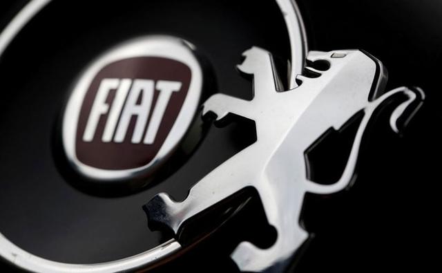 Fiat Chrysler Automobiles NV on Thursday brushed off a shock lawsuit from General Motors Co and said it was confident of reaching a binding merger deal with Peugeot owner PSA Group by the end of this year to create the world's fourth-largest carmaker.