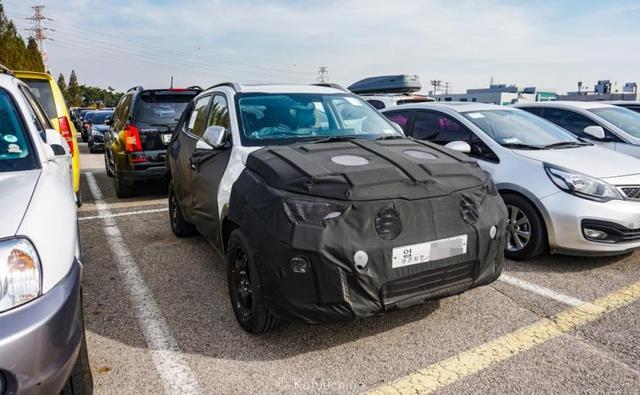 Images of the prototype model of Kia's upcoming subcompact SUV, codenamed QYI, have recently surfaced online. The Hyundai Venue and Maruti Suzuki Vitara Brezza-rivalling SUV was spotted testing in Kia's home market, South Korea, and it's slated to be launched in India sometime in 2020.