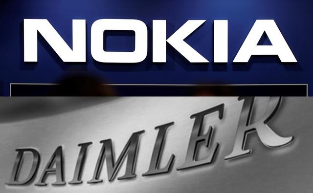 Finnish telecoms equipment maker Nokia has suspended legal action against German carmaker Daimler in the hope that mediation will resolve their dispute over technology licensing fees.