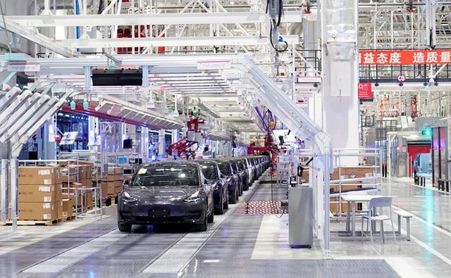 Tesla Inc's vehicle orders in China nearly halved in May from April, against the backdrop of increased government scrutiny on the U.S. electric carmaker, the Information reported on Thursday, citing internal data.
