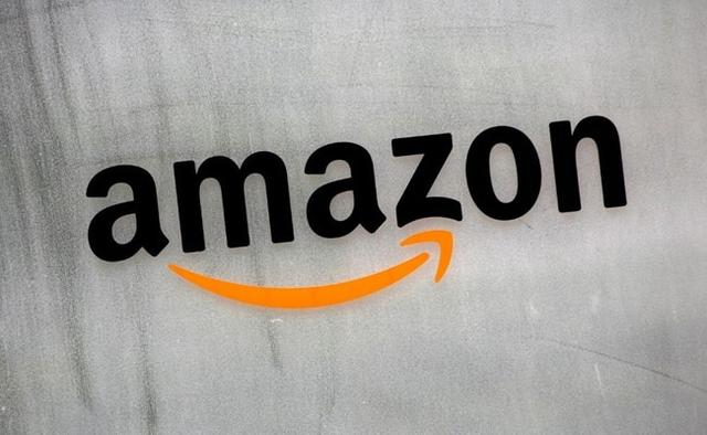 Amazon.com Inc has agreed to pay over $1 billion to buy self-driving startup Zoox Inc, the Information reported on Thursday, citing sources, in a move that would expand the e-commerce giant's reach in autonomous-vehicle technology.
