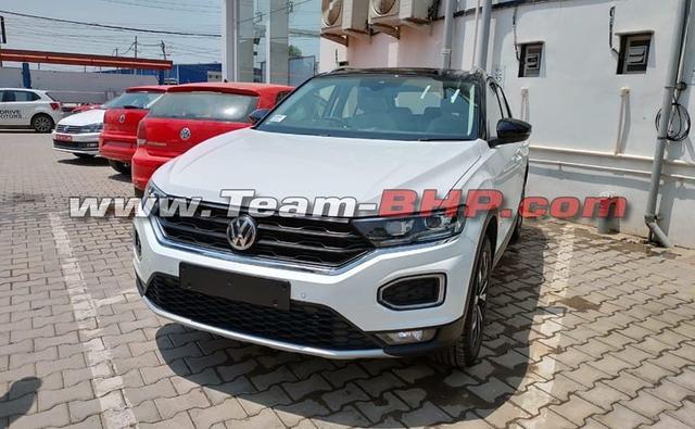 A set of leaked images confirm that the Volkswagen T-Roc, the newest addition to VW's Indian line-up, has started reaching dealerships. Earlier in April during an online chat, Steffen Knapp, Director, Volkswagen Passenger Cars India, told carandbike that the company will begin despatches of its newly launched vehicles from May 2020.