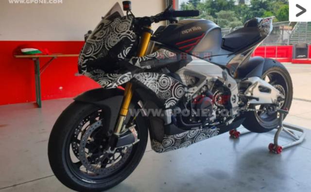 The updated Aprilia Tuono 1100 sports MotoGP-style wings, and a spy video shows the bike being tested at the Imola circuit in Spain.