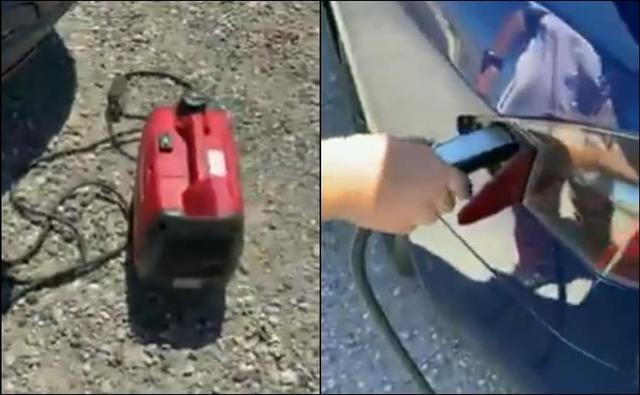 A Tesla owner using a Honda gasoline generator to charge his all-electric car has caught the attention of Anand Mahindra, Chairman of the Mahindra Group. A video has gone viral on social media wherein a Honda generator is being used to charge his Tesla car. This quirky jugaad had left Anand Mahindra completely impressed and he was quick to share this innovative video on his official Twitter account. He shared the video by saying, "And we thought jugaad was purely an Indian talent! Hilarious. A Honda-powered Tesla..."