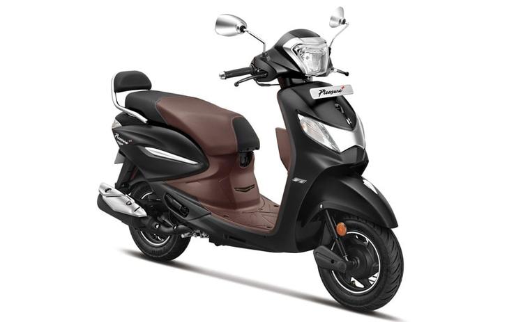 The Hero Pleasure+ Platinum edition brings a retro styling theme on the scooter with new chrome accents, seat cover, matte black paint scheme and more.