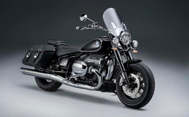 The base BMW R 18 cruiser gets more touring ability with the new BMW R 18 Classic with the addition of a windshield, saddlebags, and different front wheel.