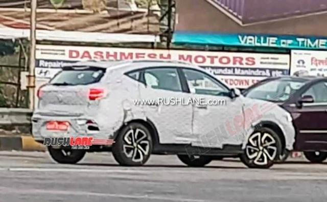 Morris Garages India is all set to further expand its product portfolio in 2021, and the 2021 MG ZS SUV, with an Internal Combustion Engine (ICE), is likely to be one of the upcoming models. Recently a test mule of the MG ZS petrol SUV was again spotted testing in India, and this time around, the vehicle was seen with a set of new dual-tone alloy wheels.