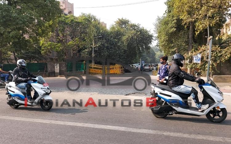 Images of the electric version of the Suzuki Burgman Street scooter have surfaced online. The new photos reveal a couple of prototype models of the electric scooter undergoing testing in India, coloured in white with blue highlights.