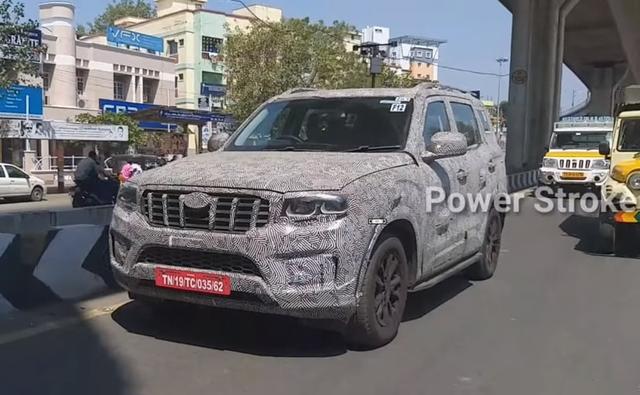 Images of the next-generation Mahindra Scorpio prototype have surfaced online, giving us a closer look at the SUV. The test mule in the photos appears to be nearing the production stage as it is seen with production parts like the double-barrel headlamps, the 7-slot grille, muscular front bumper and 17-inch multi-spoke alloy wheels.