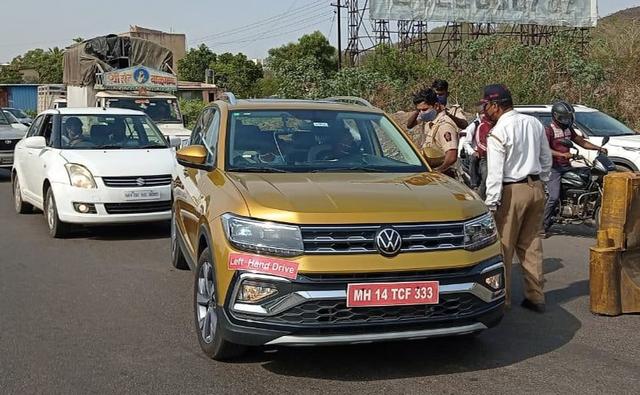A left-hand-drive Volkswagen Taigun has been spotted at a Police checkpost near on the Mumbai-Satara stretch which means models which will be exported to other markets are also being tested on India soil.
