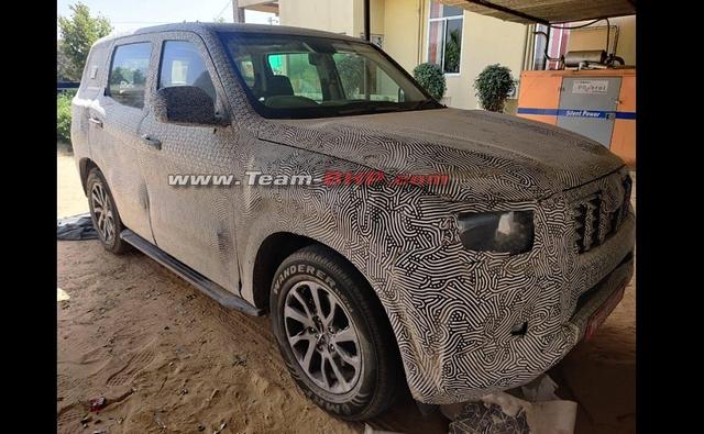 The upcoming new-generation Mahindra Scorpio has been spotted yet again, and while the exterior of the SUV is still heavily camouflaged, this time around we do get a clean look at the SUV's cabin.
