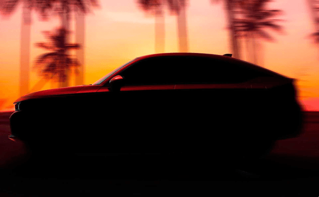 The 2022 Honda Civic Hatchback is all set to break cover On June 23 and the teaser image suggests that it won't look very different than the sedan, save for the hatch at the rear.
